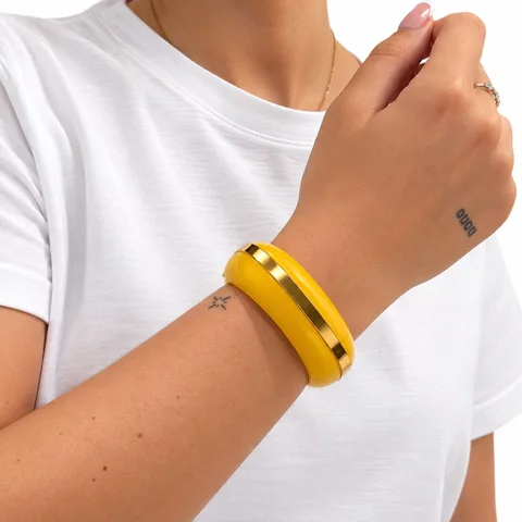 Pulsera rígida amarilla con dorado — foto 2